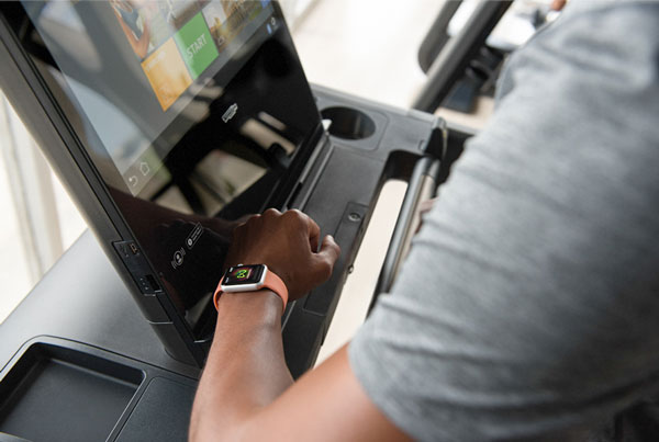 GymKit — tap Apple Watch on Technogym